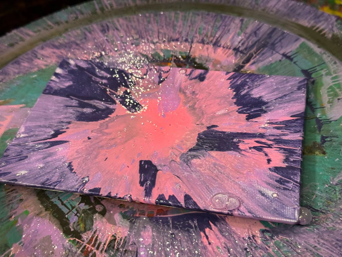 Pink and purple spin-art canvas