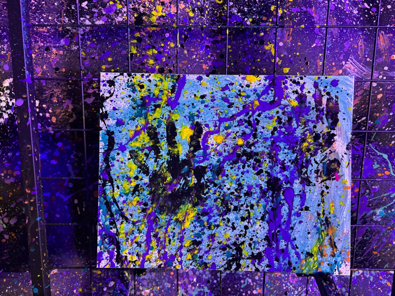 A bright splatter-painted canvas